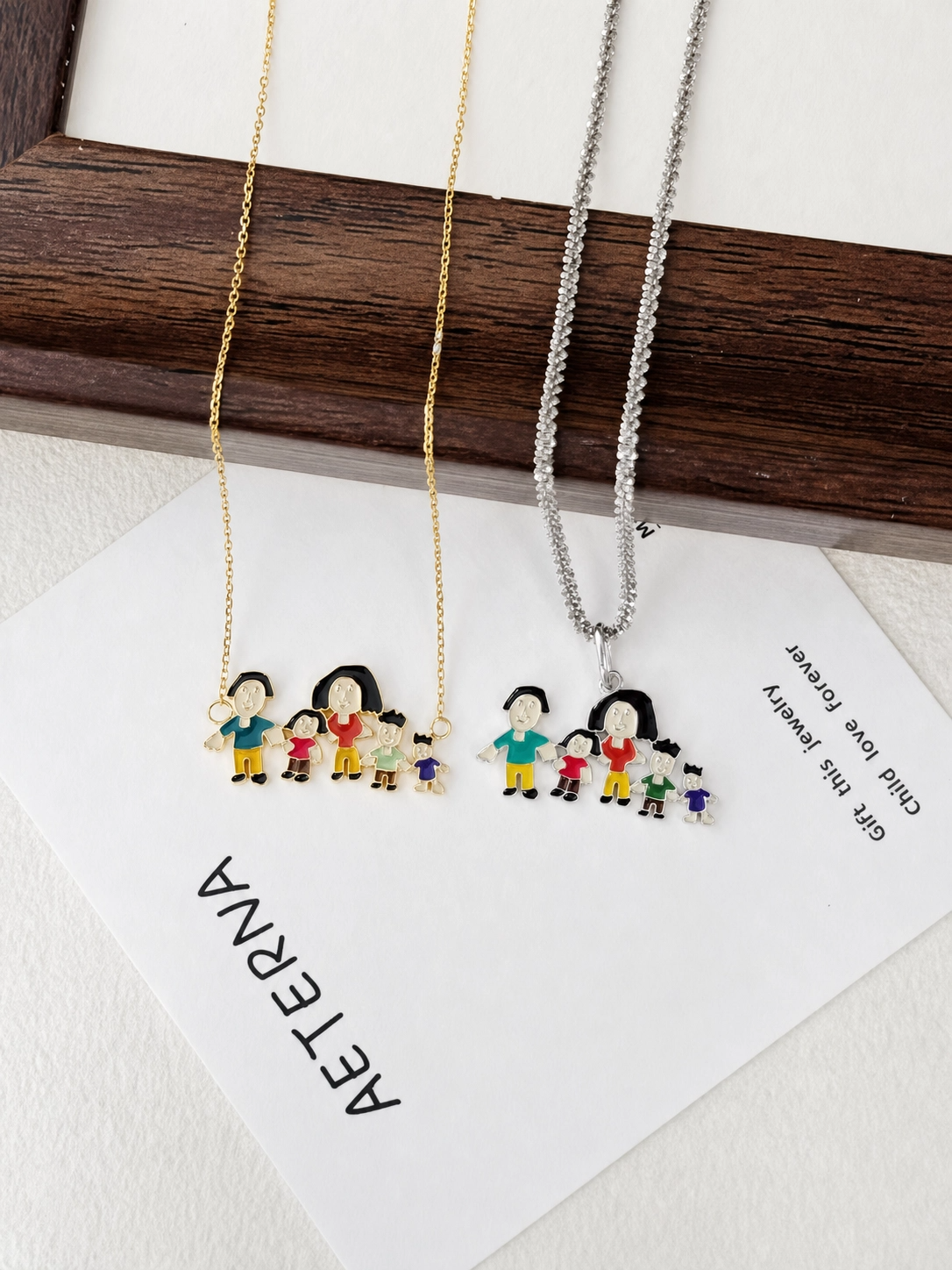 Custom family drawing necklace in gold and silver